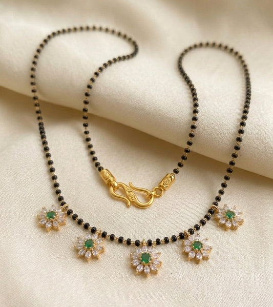 Elegant Floral Mangalsutra Necklace with Emerald and White AD Stones