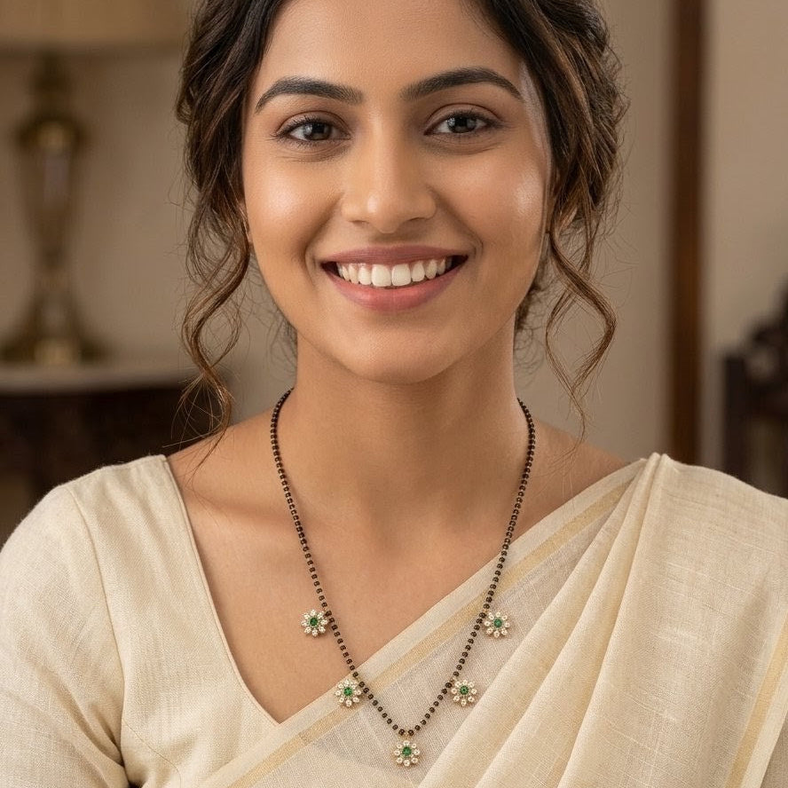 Elegant Floral Mangalsutra Necklace with Emerald and White AD Stones