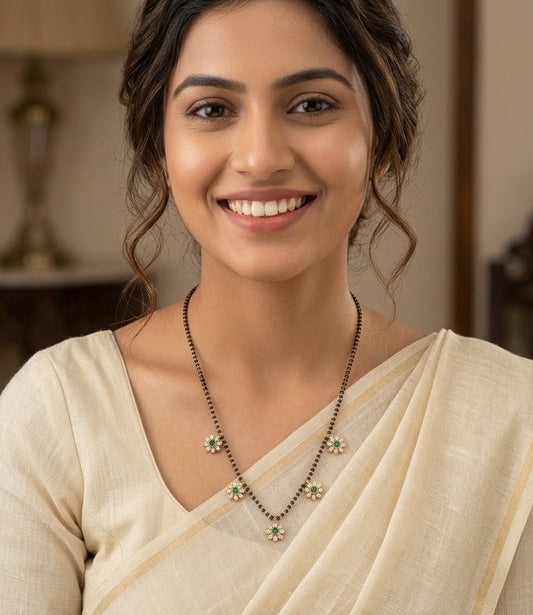 Elegant Floral Mangalsutra Necklace with Emerald and White AD Stones
